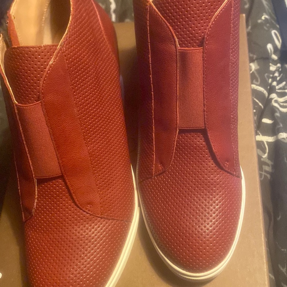 Red leather, tennis shoe heels never worn
